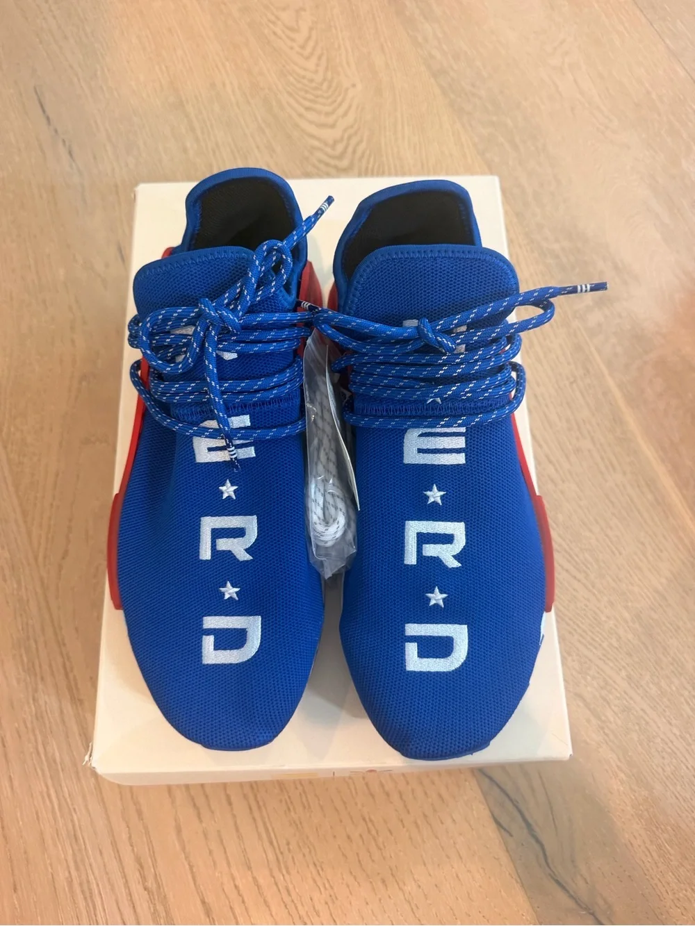 adidas Blue and Red Pharrell Williams NMD Sneakers
